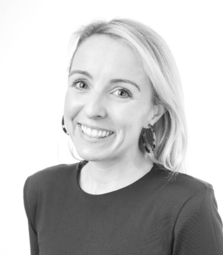 headshot of woman on white background