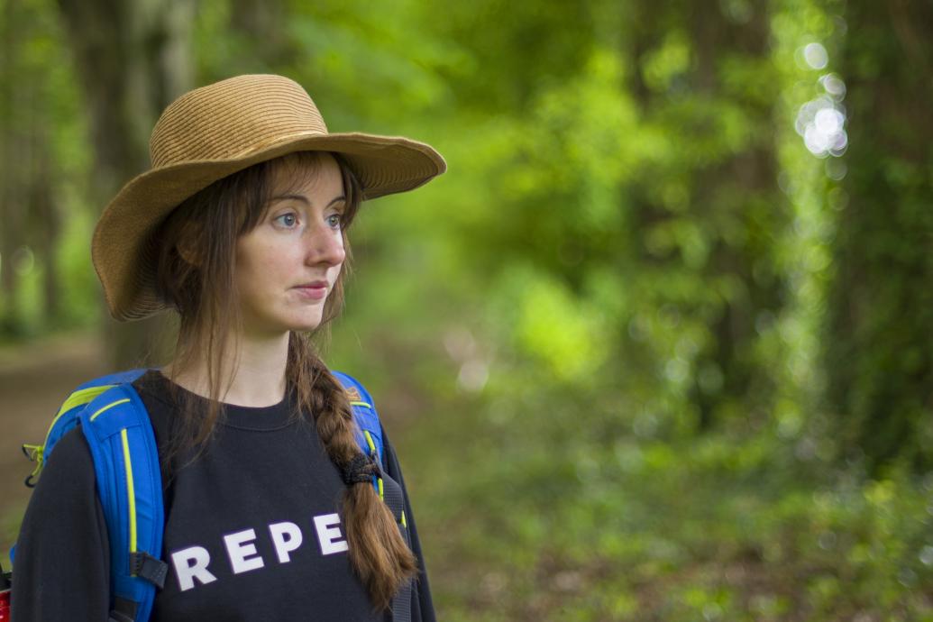 woman in a hat outdoors